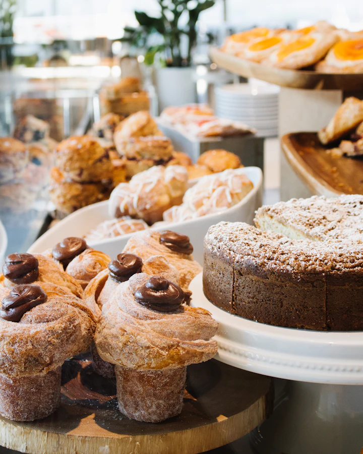 Pastries and a crumb cake on the counter